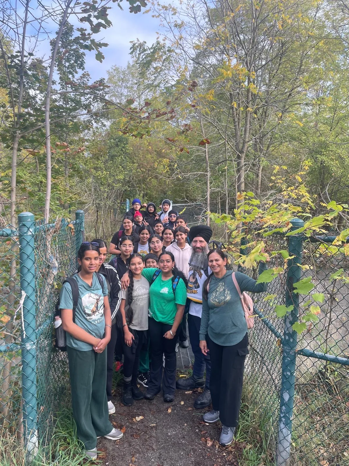 Progress Peel youth standing together on a trail