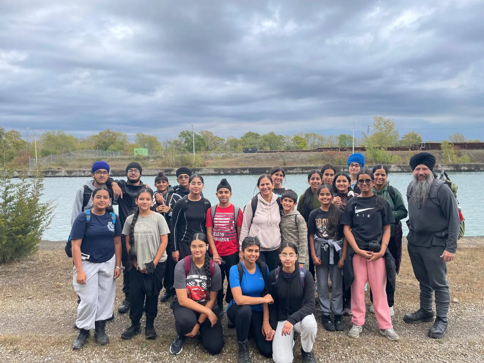 Progress Peel group photo near water